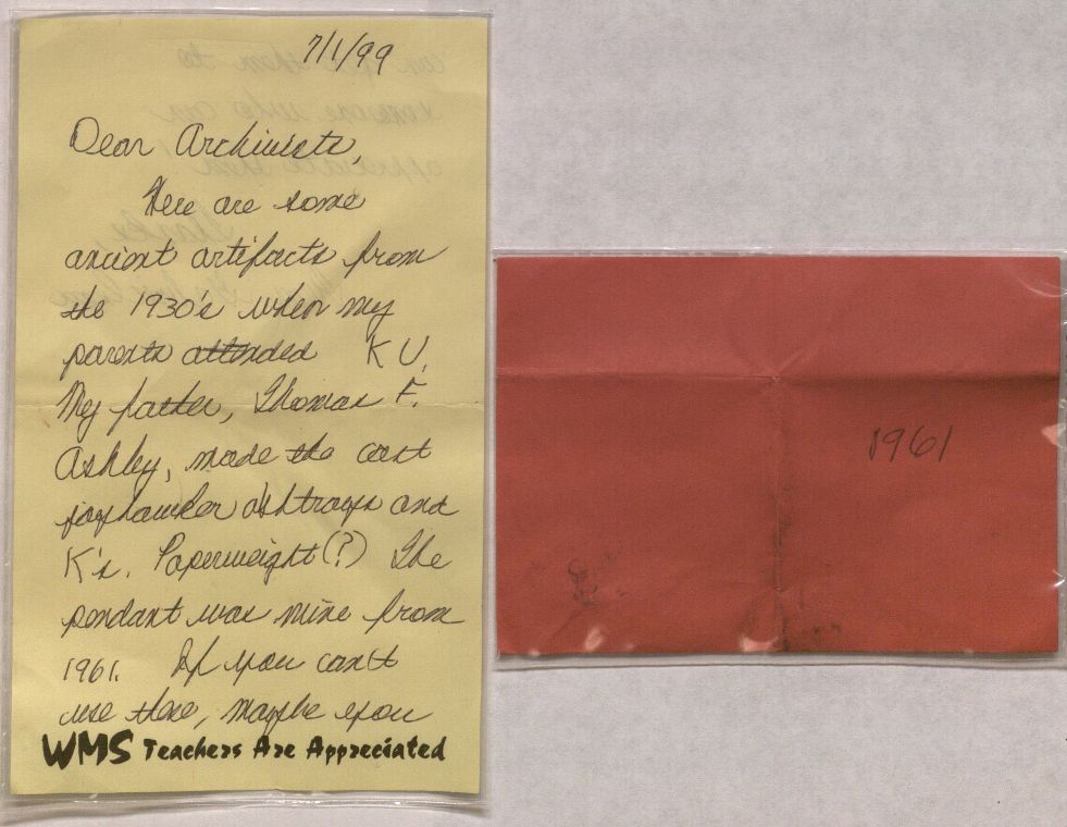 Photo of note and envelope accompanying the metal Jayhawk paraphernalia