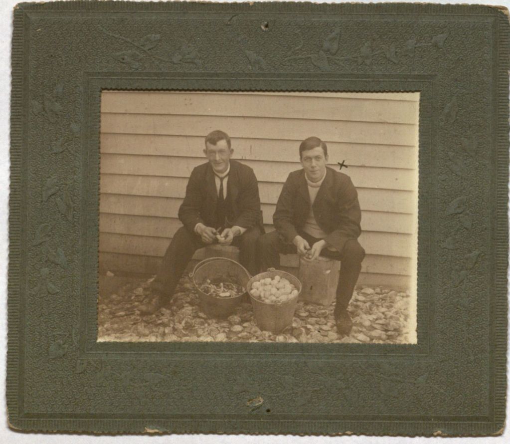 Photograph of Hector C. Henderson (right) and unidentified man.