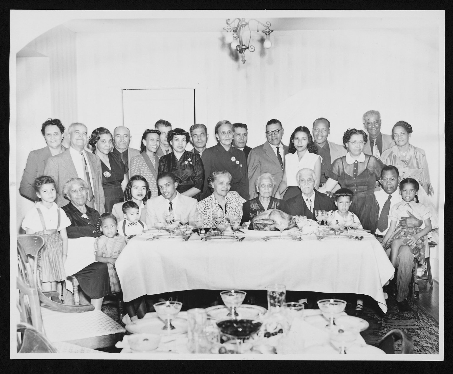 Photograph of Graves-Williams-Dandridge family at Thanksgiving.  Wichita, Kansas. 1953.