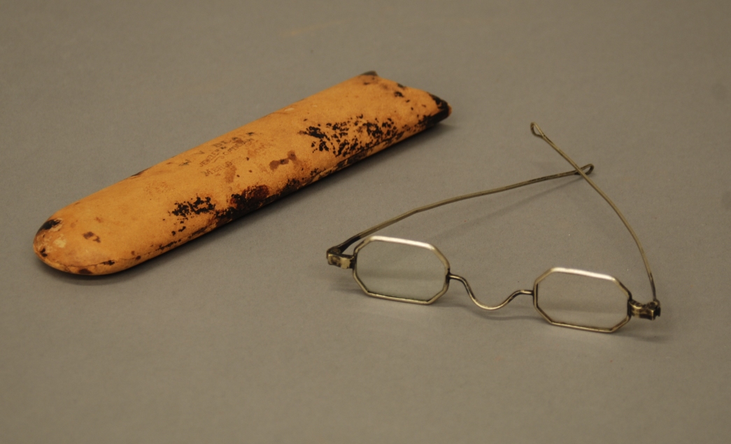 Photograph of Charity Birdsey Miller's glasses and glasses case