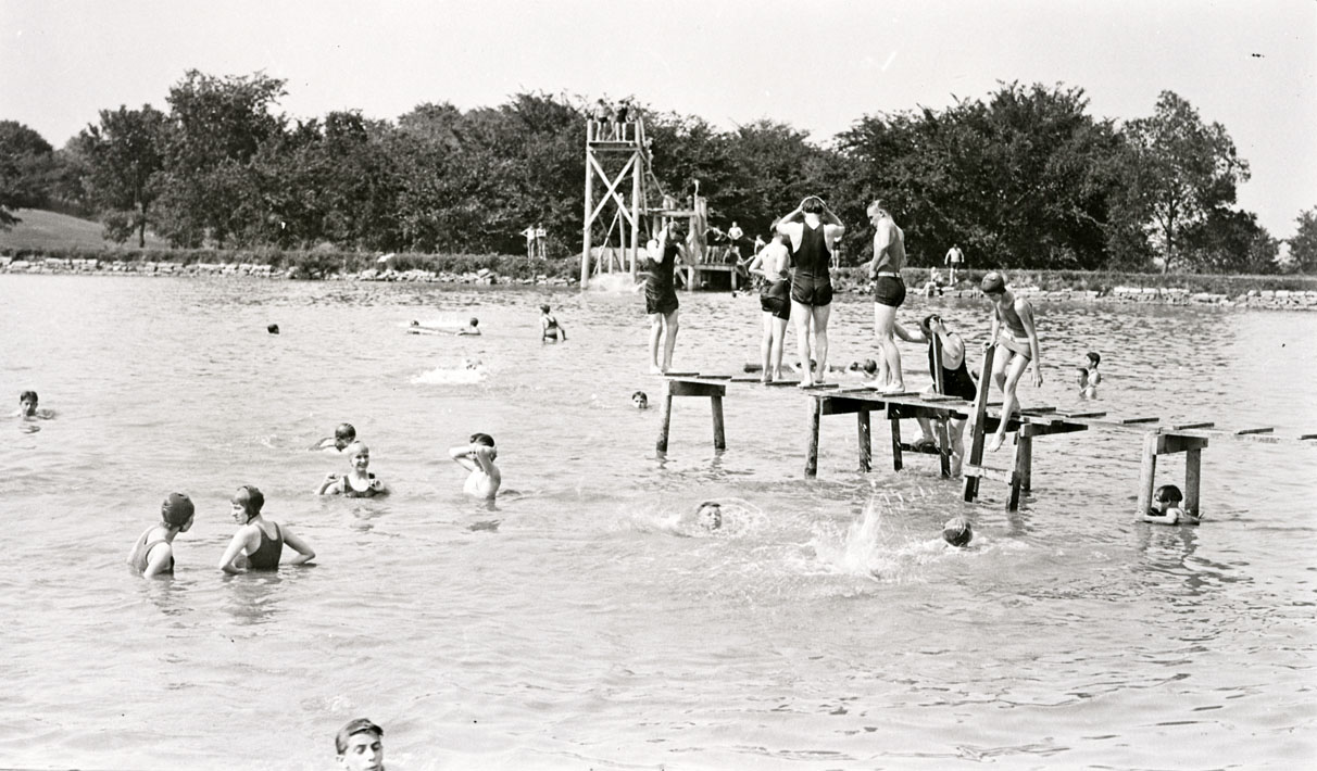 Photograph of people swimming at Potter Lake, 1925