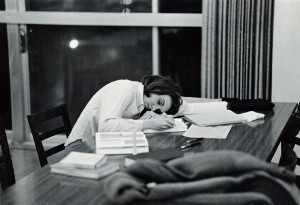 Photograph of student asleep while studying, 1967-1968. 
