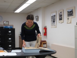 Photograph of University Archives intern JoJo Palko at the desk