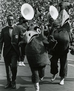 Photograph of Chancellor Chalmers with new Baby Jay at Homecoming, 1971