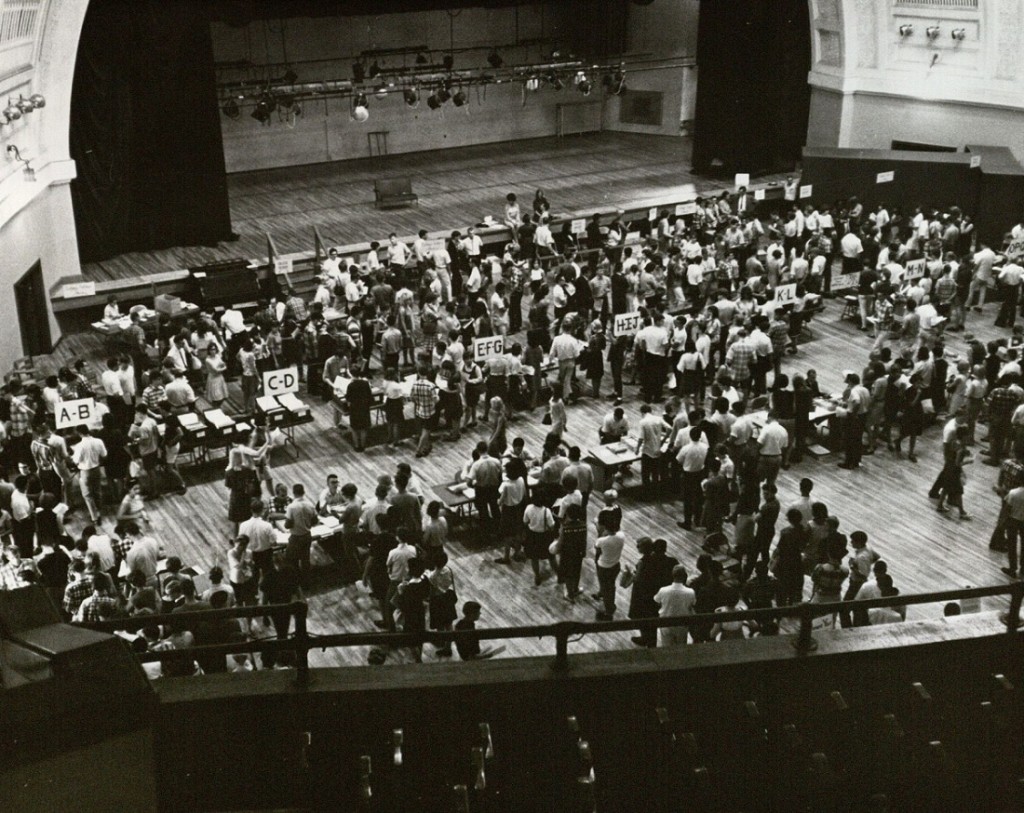 Photograph of students picking up paperwork in Hoch Auditorium, 1968