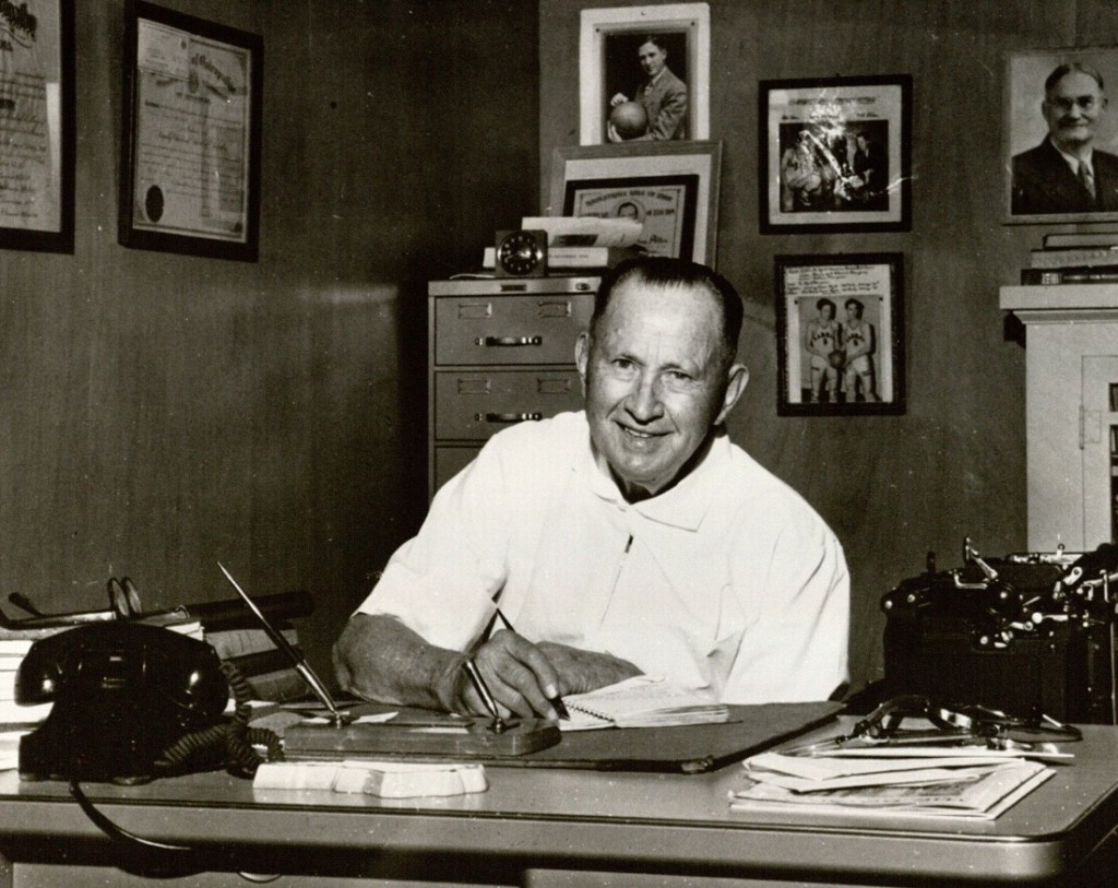 Photograph of Phog Allen at desk, 1950
