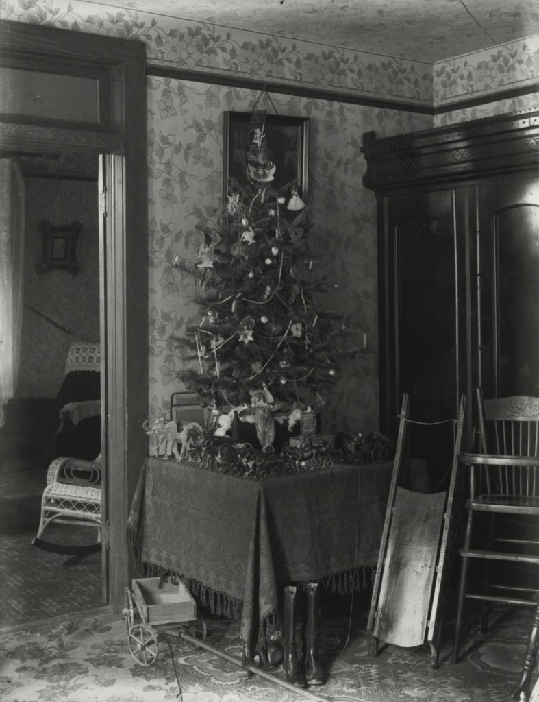 Photograph of a room interior with Christmas tree, 1896