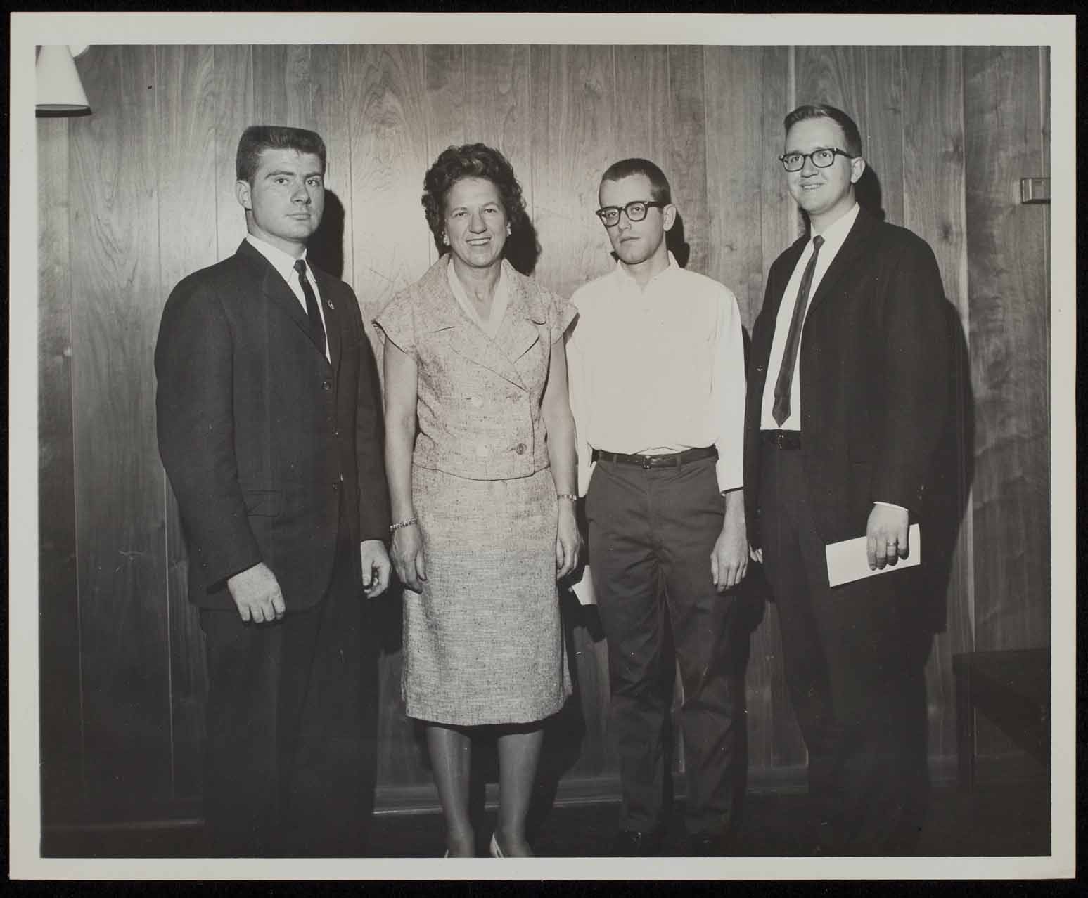 1964 Contest Winners Laird Wilcox,  Lawrence Morgan, and Jerry L. Ulrich, with Elizabeth M. Taylor.
