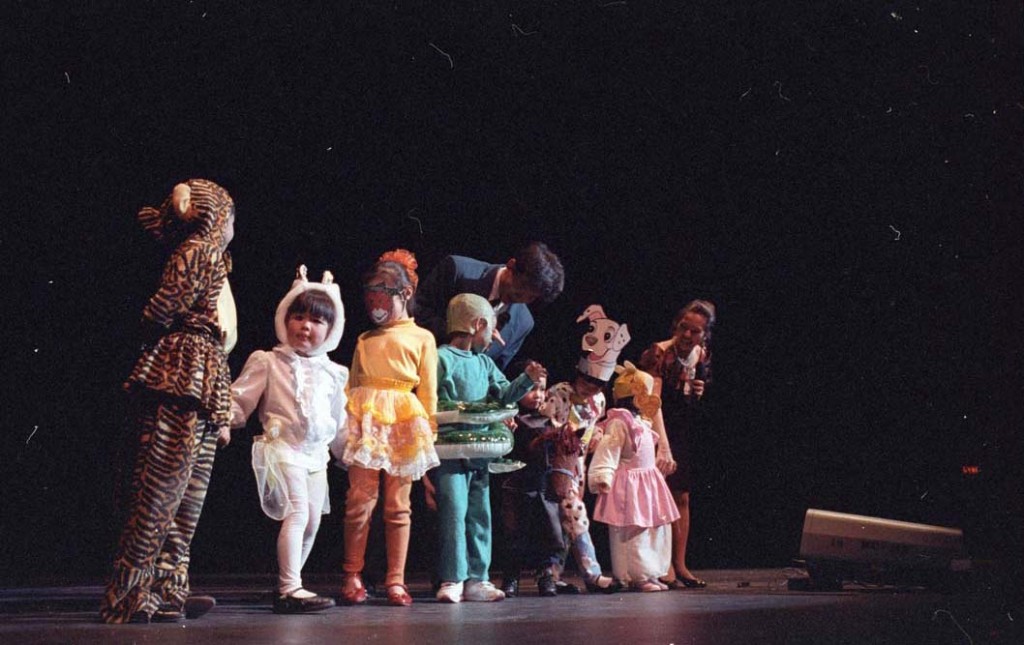 Photograph of a Chinese New Year celebration, children in costume, 1994