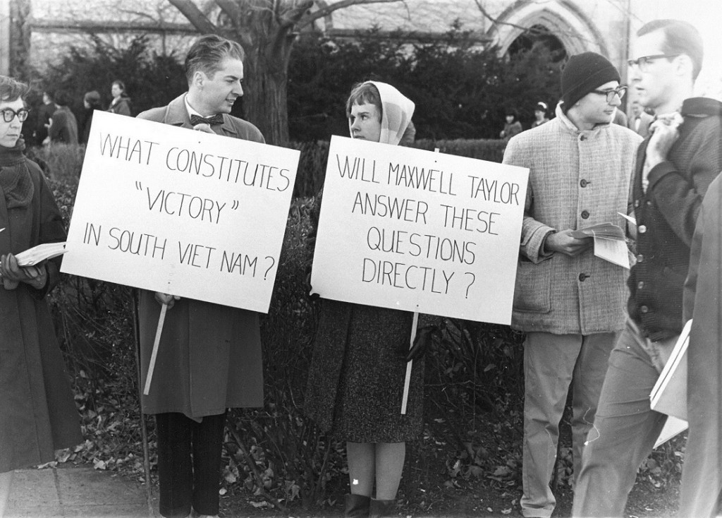 Photograph of protests in advance of Maxwell Taylor's speech, 1965 December 5