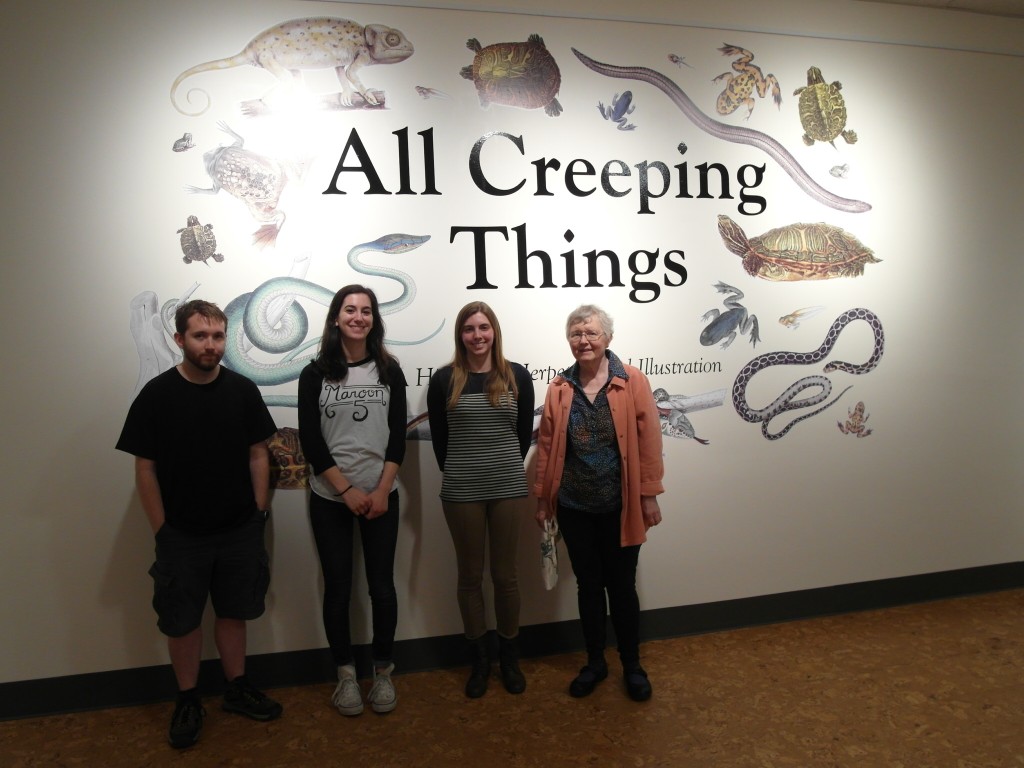 Photograph of the MUSE 703 exhibit team in front of title