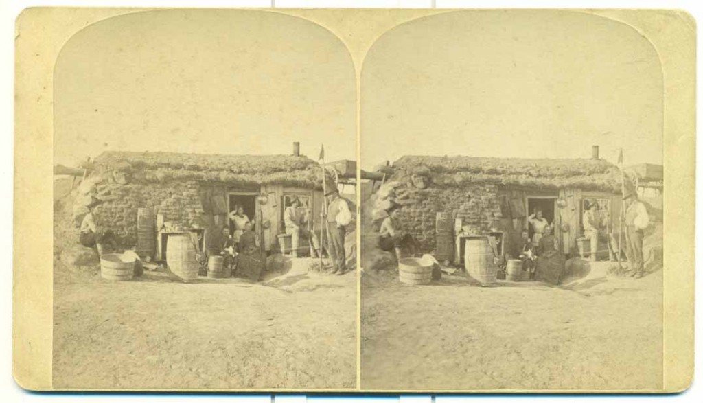 Photograph of a dugout sod home, Kansas, undated