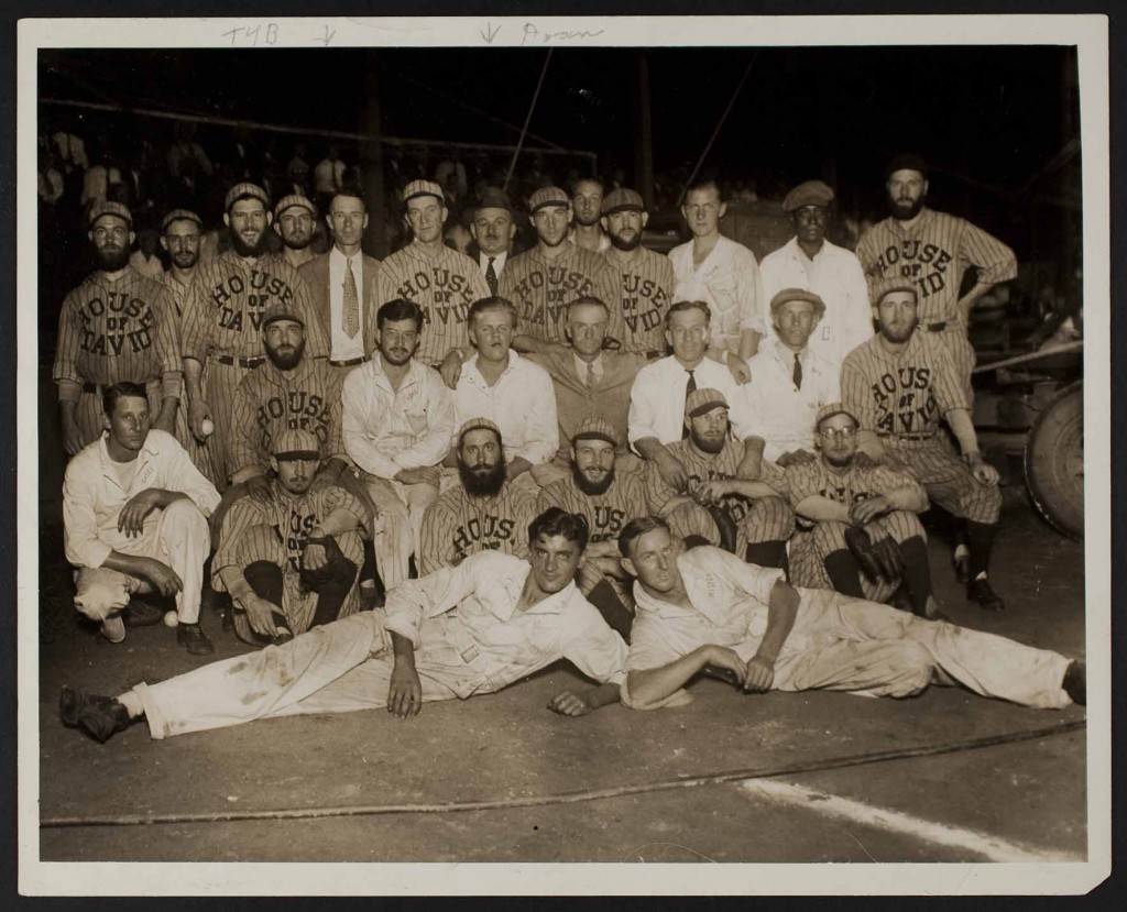 Photograph of T. Y. Baird with a House of David team and the Kansas City Monarchs light boys, undated
