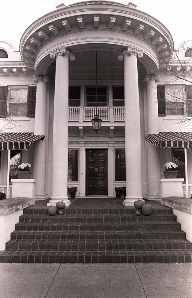 Photograph of pumpkins decorating the porch at the Chancellor's residence, 1986