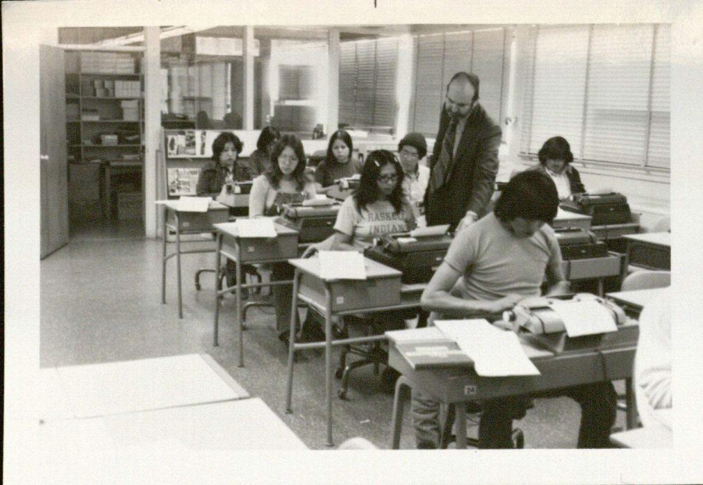 Vivian McAllister and students typing in class.