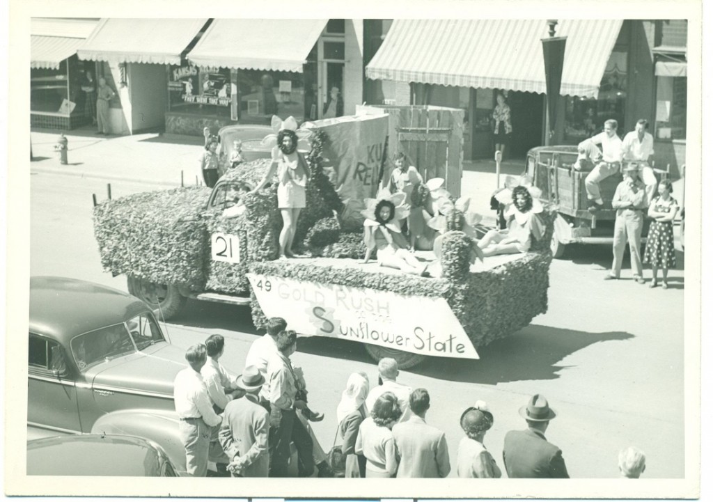 Photograph of the Kansas Relays Parade, girls in sunflower costumes, 1949