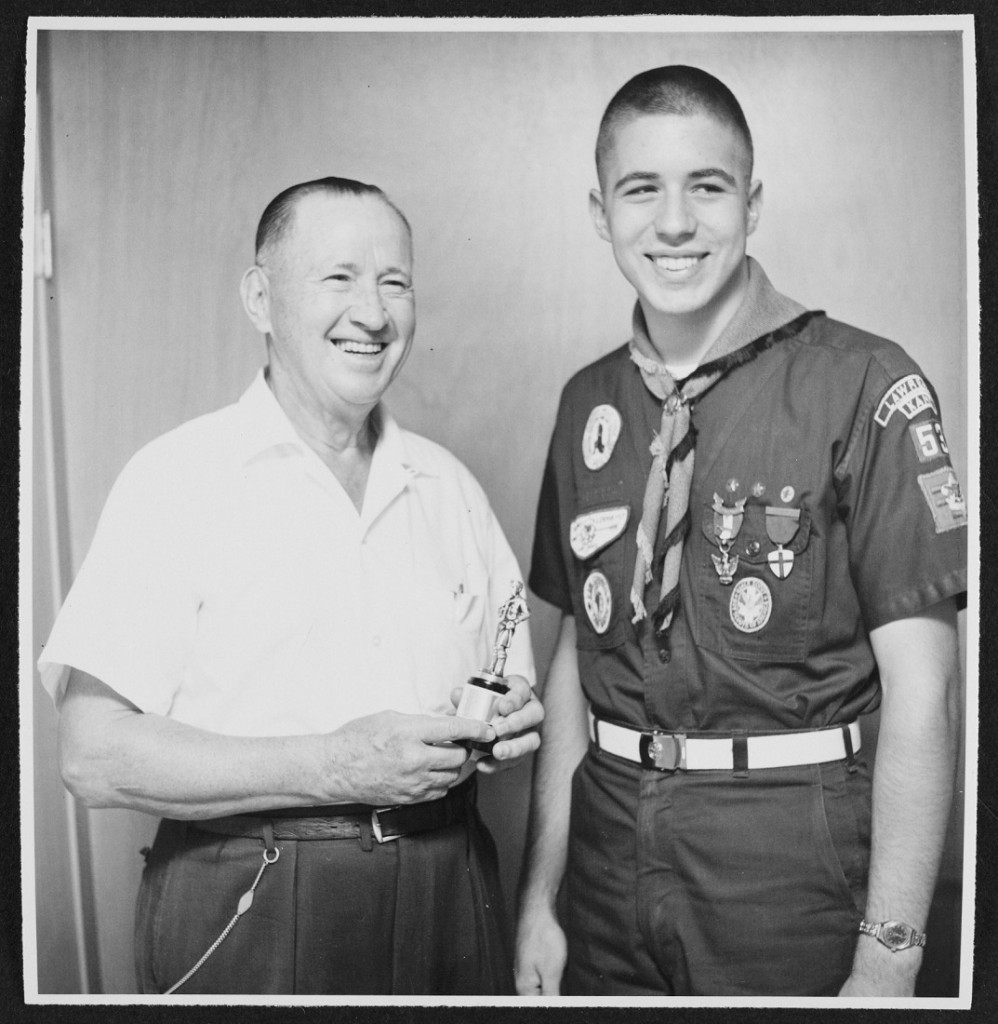 Photograph of Phog Allen posing with a boy scout, 1958 