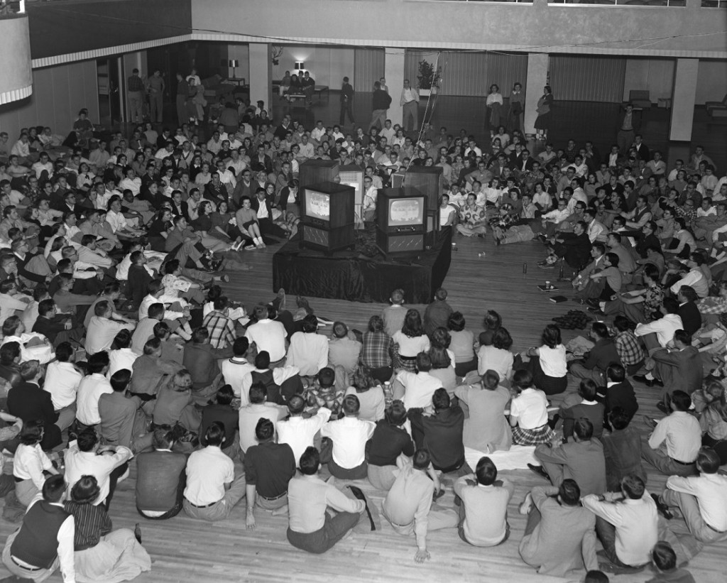 Photograph of KU fans watching basketball in the Memorial Union, 1951-1952