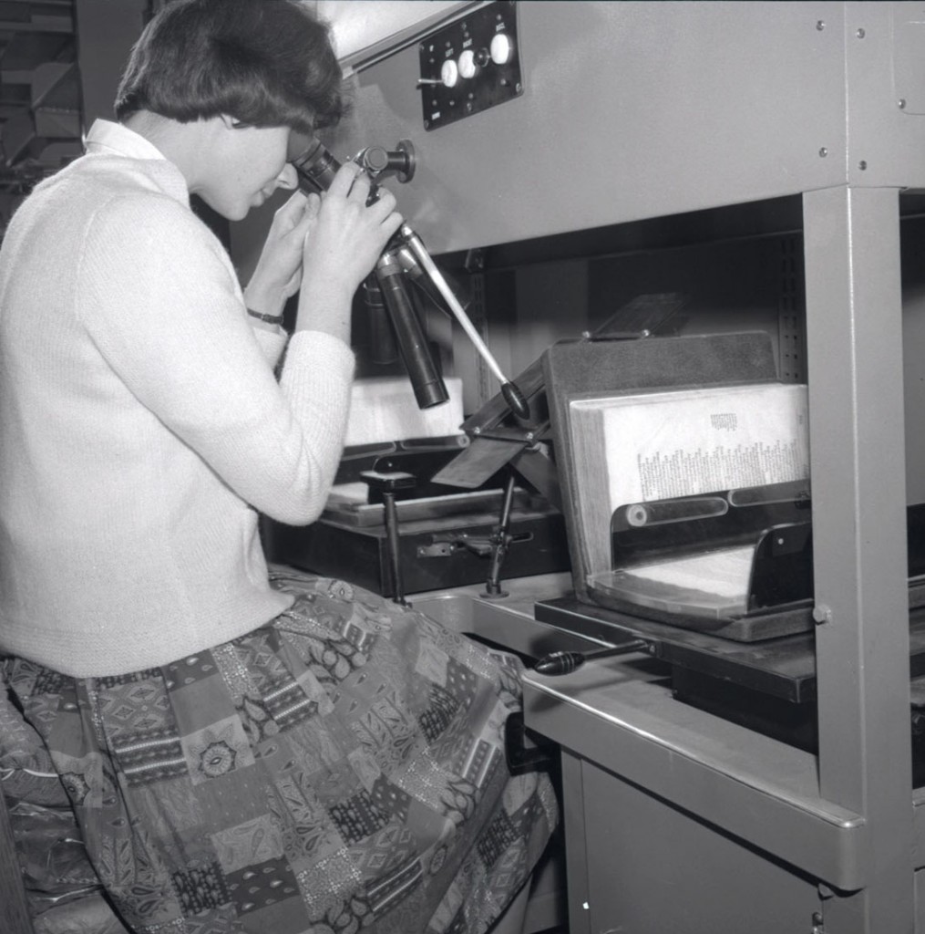 Photograph of woman using Hinman Collator, 1959