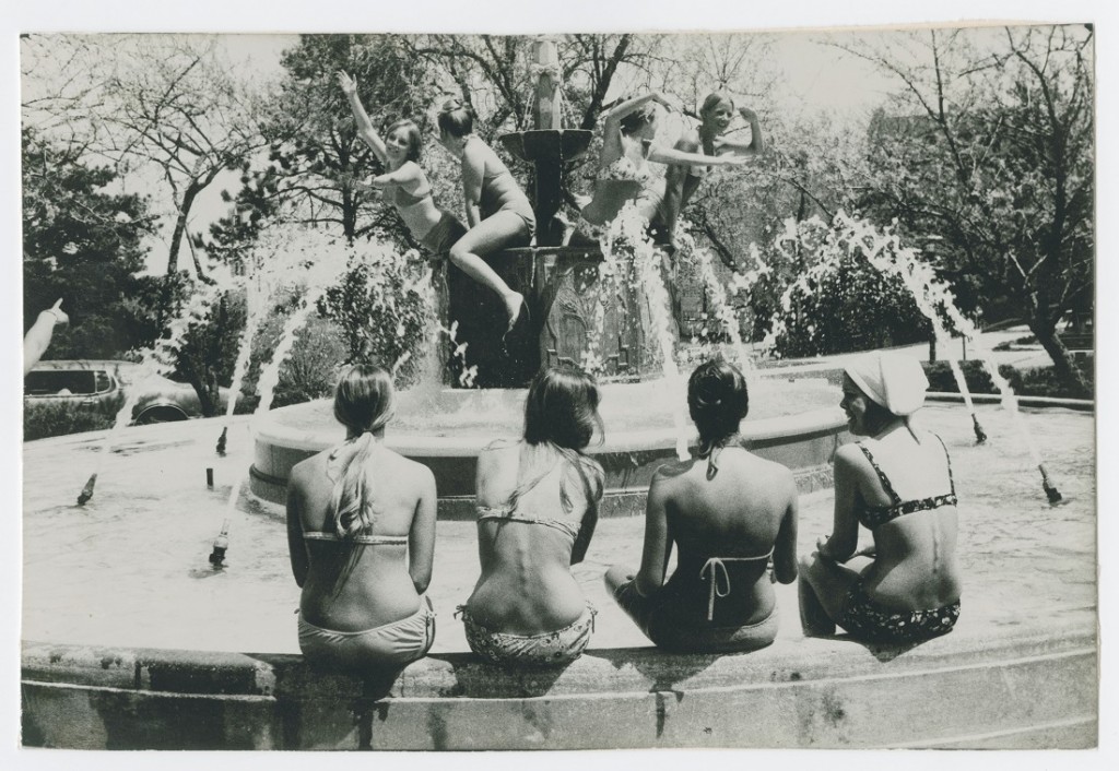 Photograph of Women sitting in the Chi Omega Fountain, 1970s