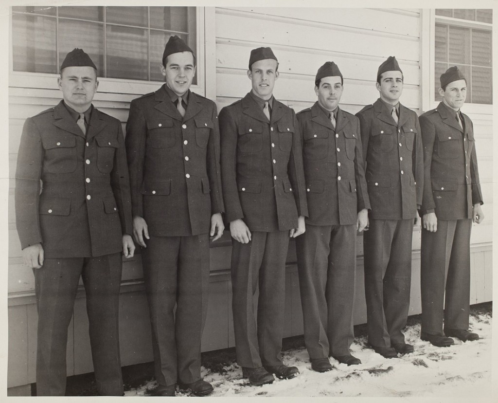 Photograph of members of the KU men's basketball team in Army uniforms, 1942-1943 