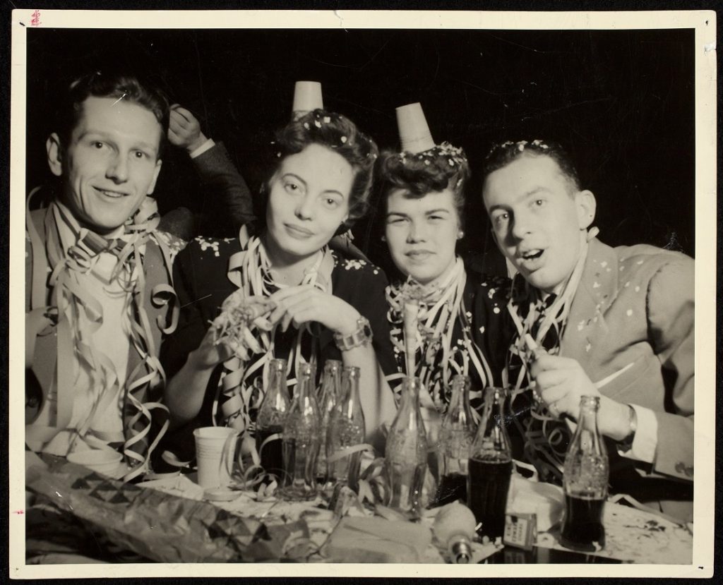 Photograph of a group at a party, 1943-1944
