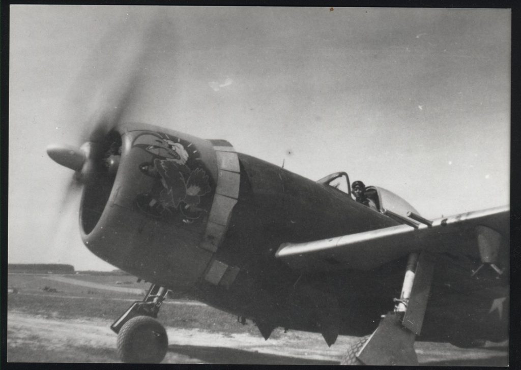 Photograph of a World War II bomber with Jayhawk nose art, 1944