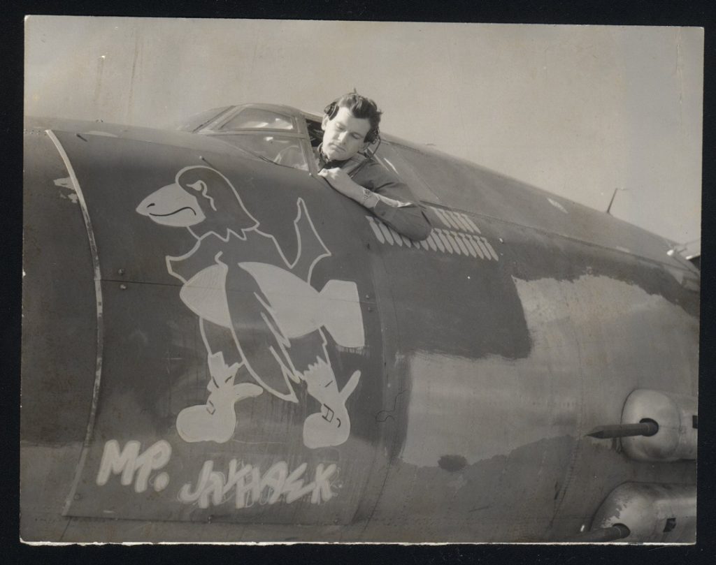 Photograph of a World War II bomber with Jayhawk nose art, 1944