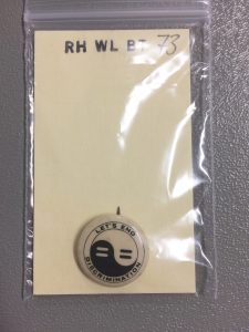 Wilcox button. Call number RH WL BT 73. Spencer Research Library.