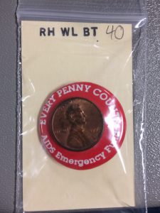 Wilcox button. Call number RH WL BT 40. Spencer Research Library.