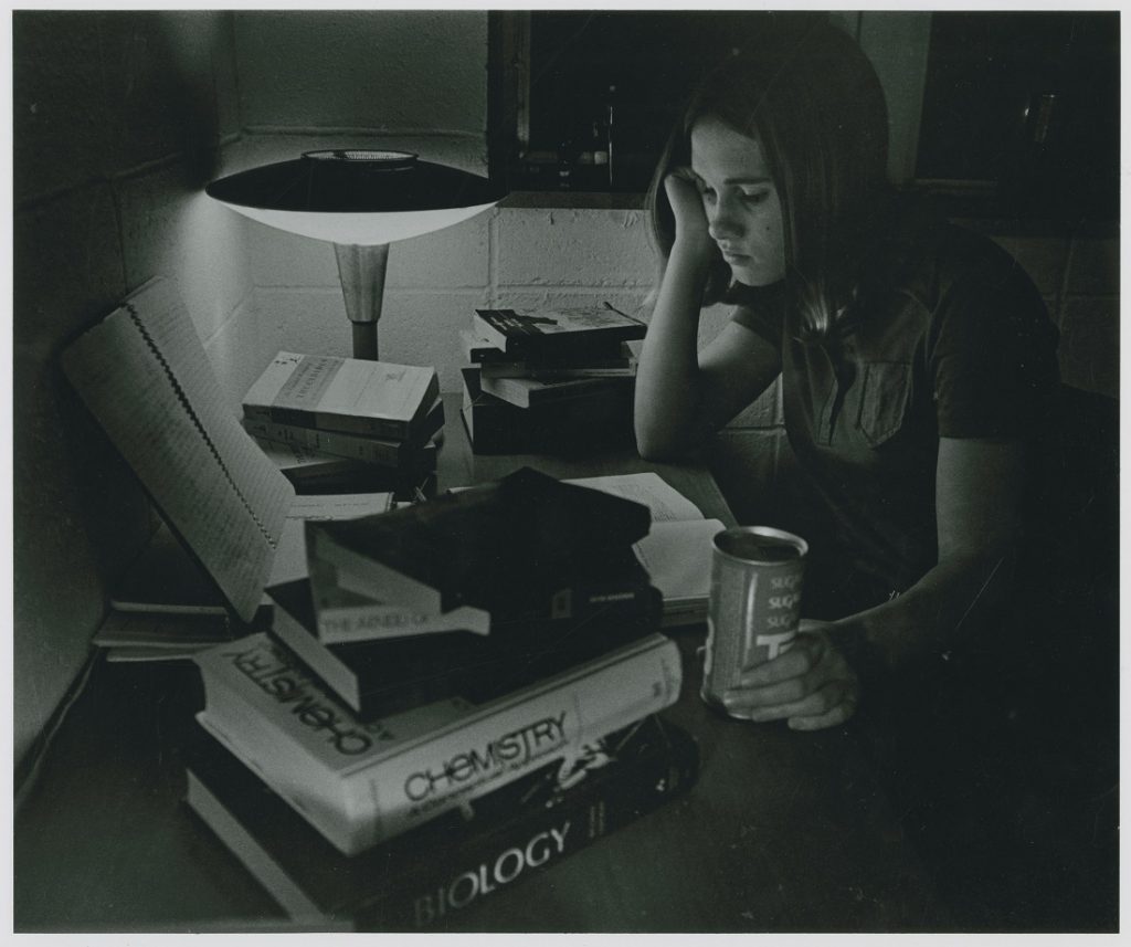 Photograph of a student studying, 1970-1971