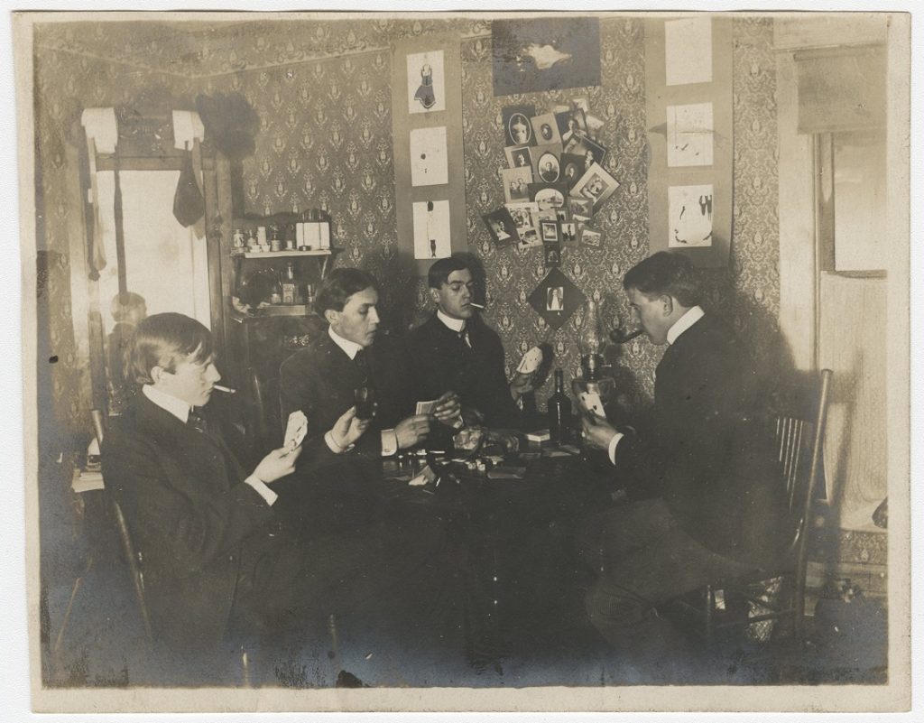 Photograph of KU students playing cards, 1900