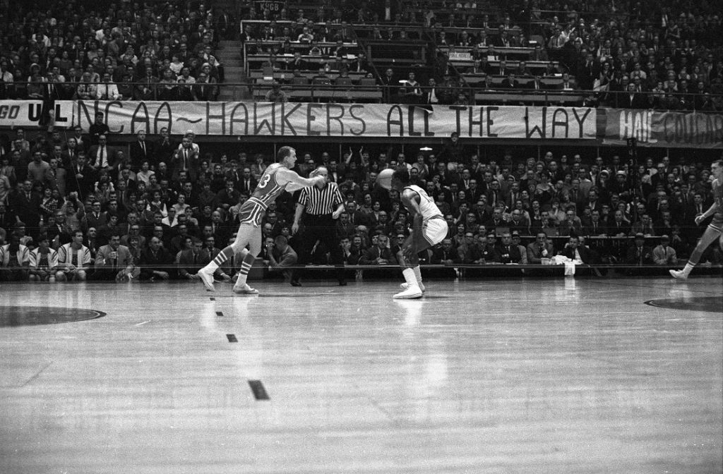 Photograph of a NCAA sign at a KU vs. University of Houston game, 1966-1967