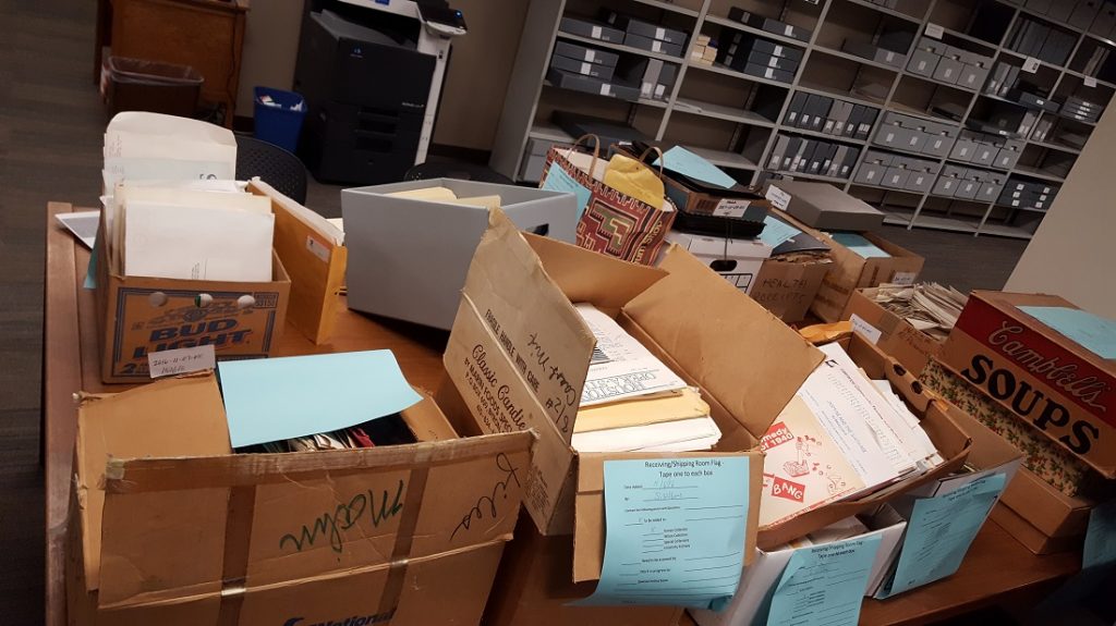 Photograph of the Jane Wofford Malin Collection being processed, 2018