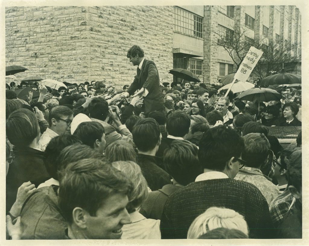 Photograph of Robert F. Kennedy with KU students outside Allen Fieldhouse, March 18, 1968