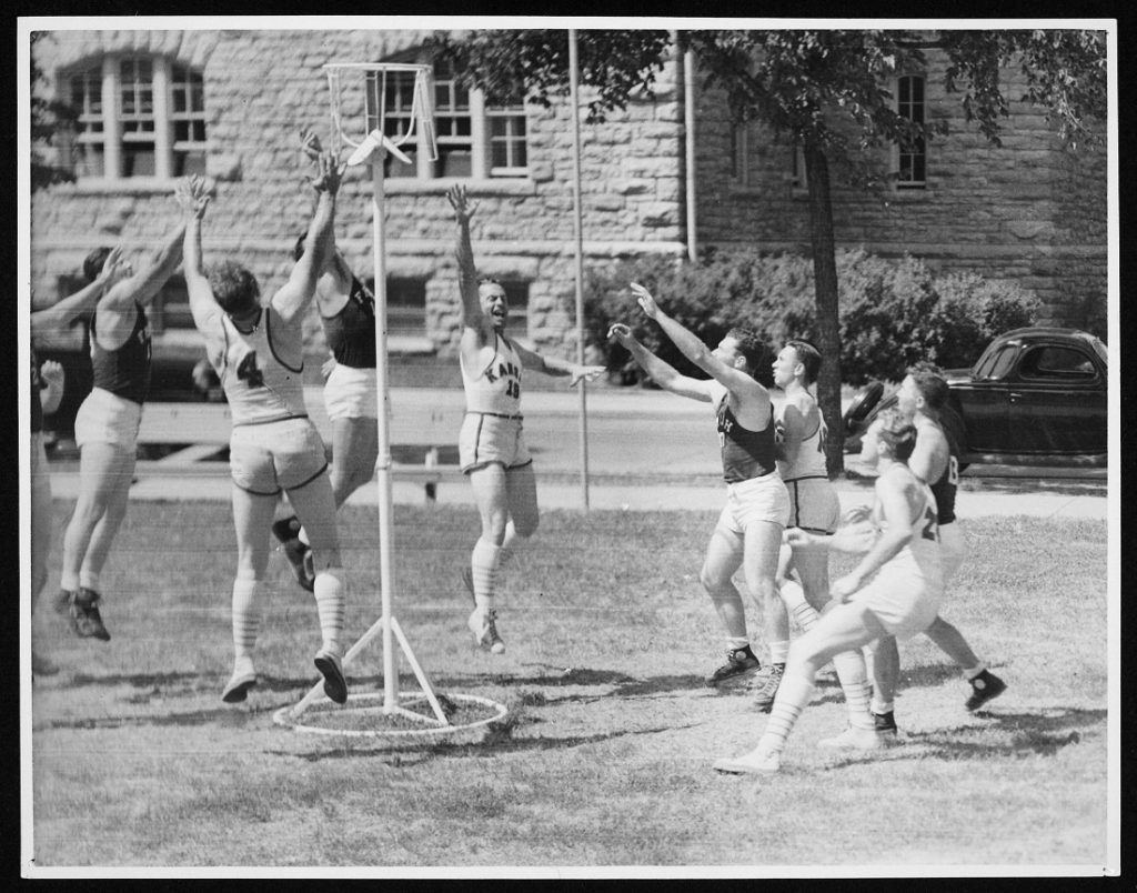 Photograph of the KU basketball team playing goal-hi, 1939