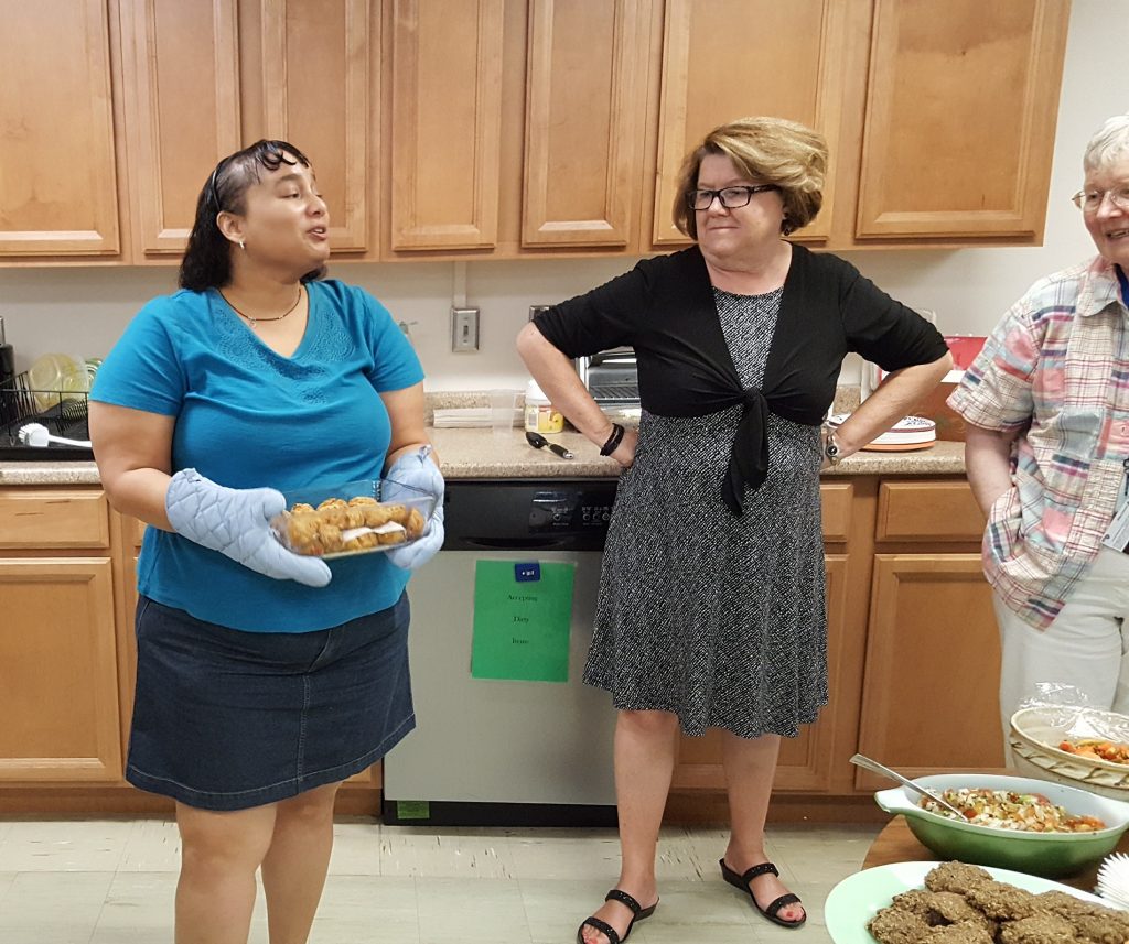 Letha Johnson (left) with her rice and cheese croquettes