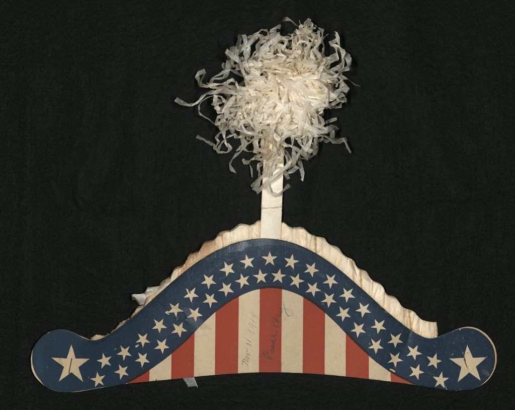 Image of the paper hat worn by Eva Lathrop Phillips on Armistice Day, November 11, 1918