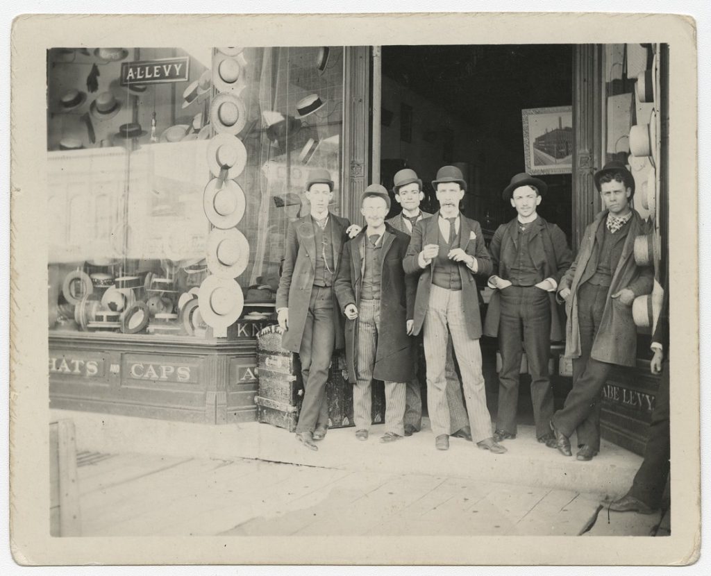 Photograph of KU students in front of Abe Levy's clothing store, 1890s