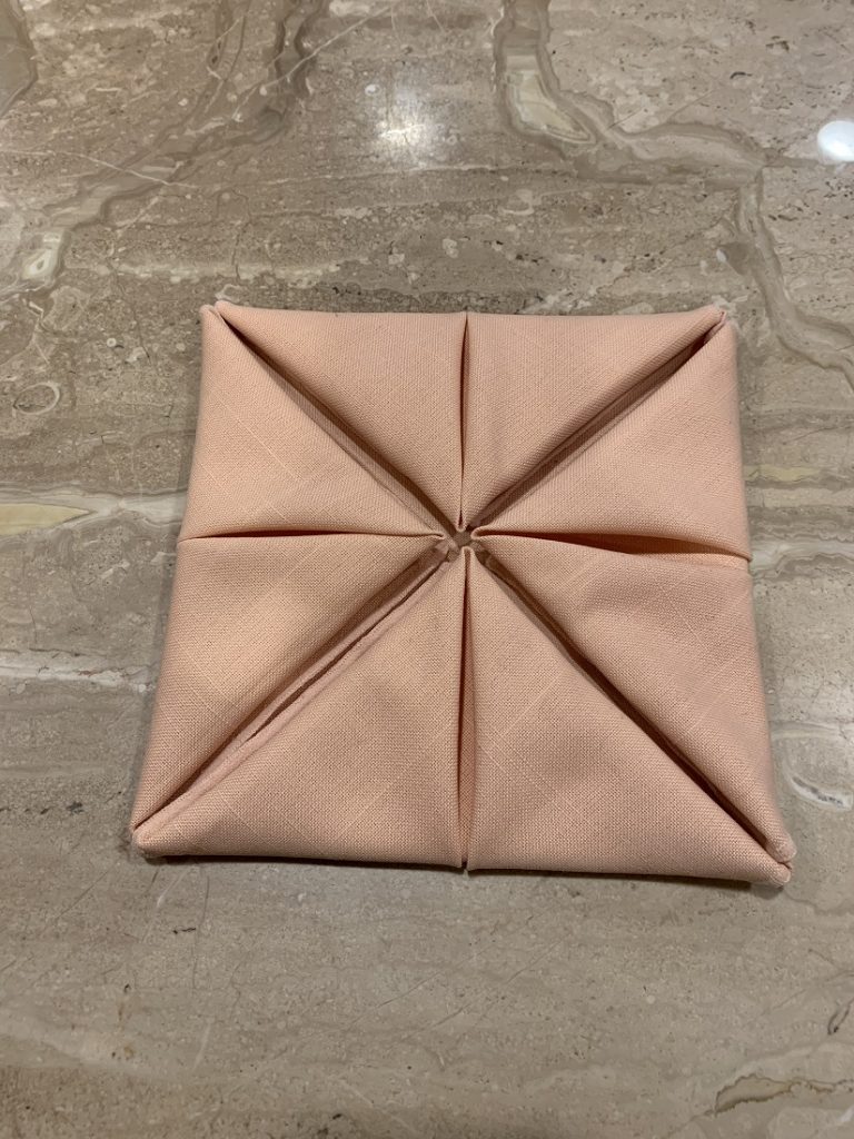 Photograph of a Pocket napkin fold attempt