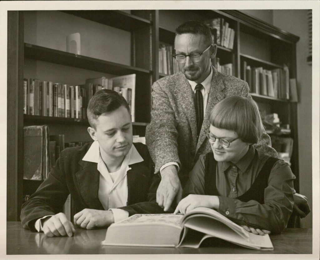 Ann Hyde (1960 Emily Taylor Book Collecting Contest winner), with second place winner E. Bruce Holmes (left), and KU libraries Assistant Director, Robert L. Quinsey (center)