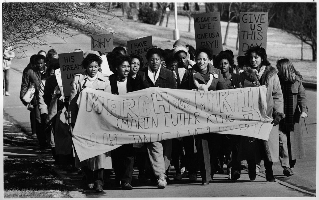 Photograph of a Martin Luther King, Jr. march at KU, 1982