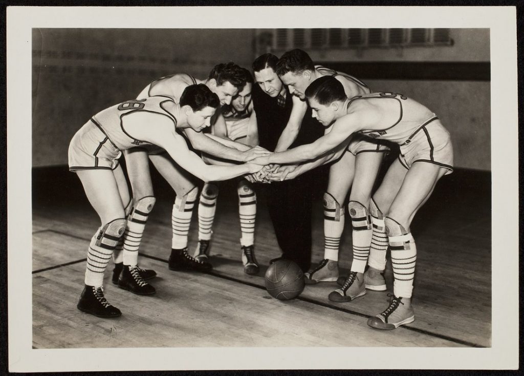 Photograph of Phog Allen with the KU men's basketball team, 1935-1936