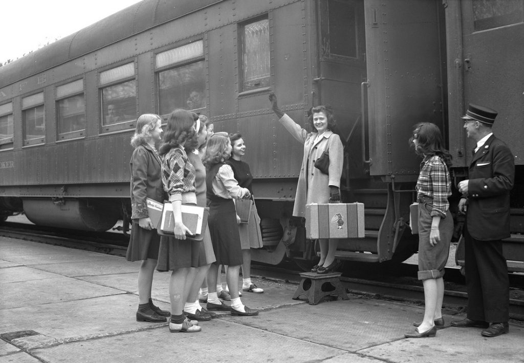 Photograph of a KU student boarding a train, 1944-1945