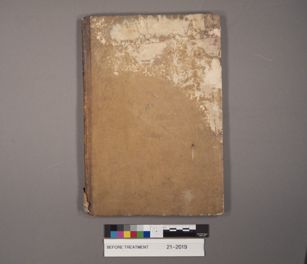 Damaged cover of MS E279, Historia flagellantium..., prior to conservation treatment.