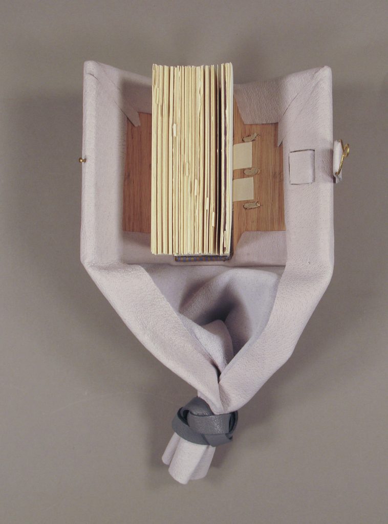 Girdle book model, open. Made by Whitney Baker.