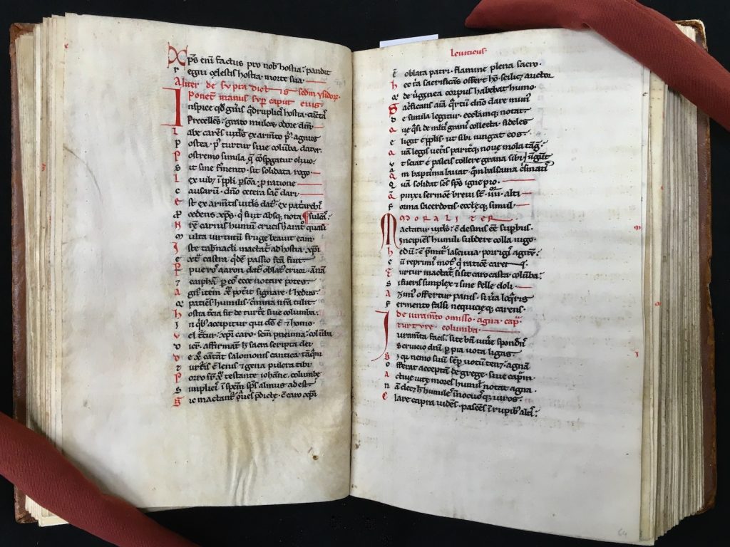 Scraped off writing still partly visible on folio 64r on the right. Petrus Riga, Aurora, Spain or southern France, first half of the thirteenth century. Call # MS C195.