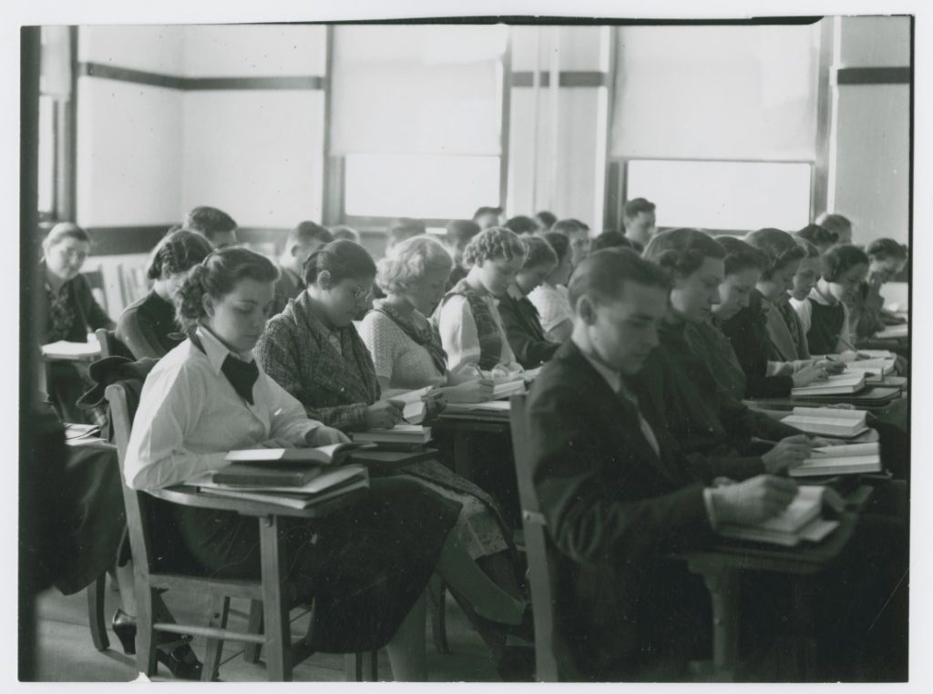 Photograph of KU students taking a test, 1935-1936