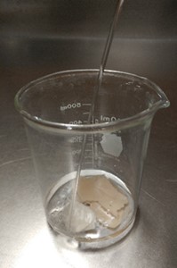 The paper pulp was turned back into a slurry by adding water.