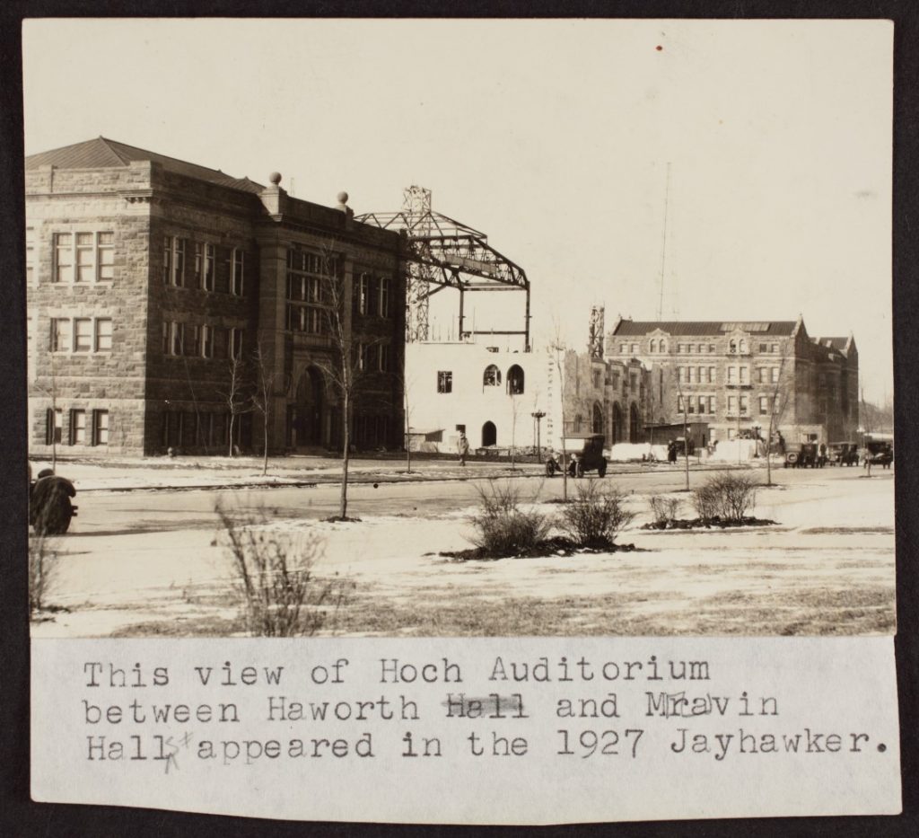 Black-and-white photograph of Hoch Auditorium with the ground level exterior completed and the building’s frame above it.